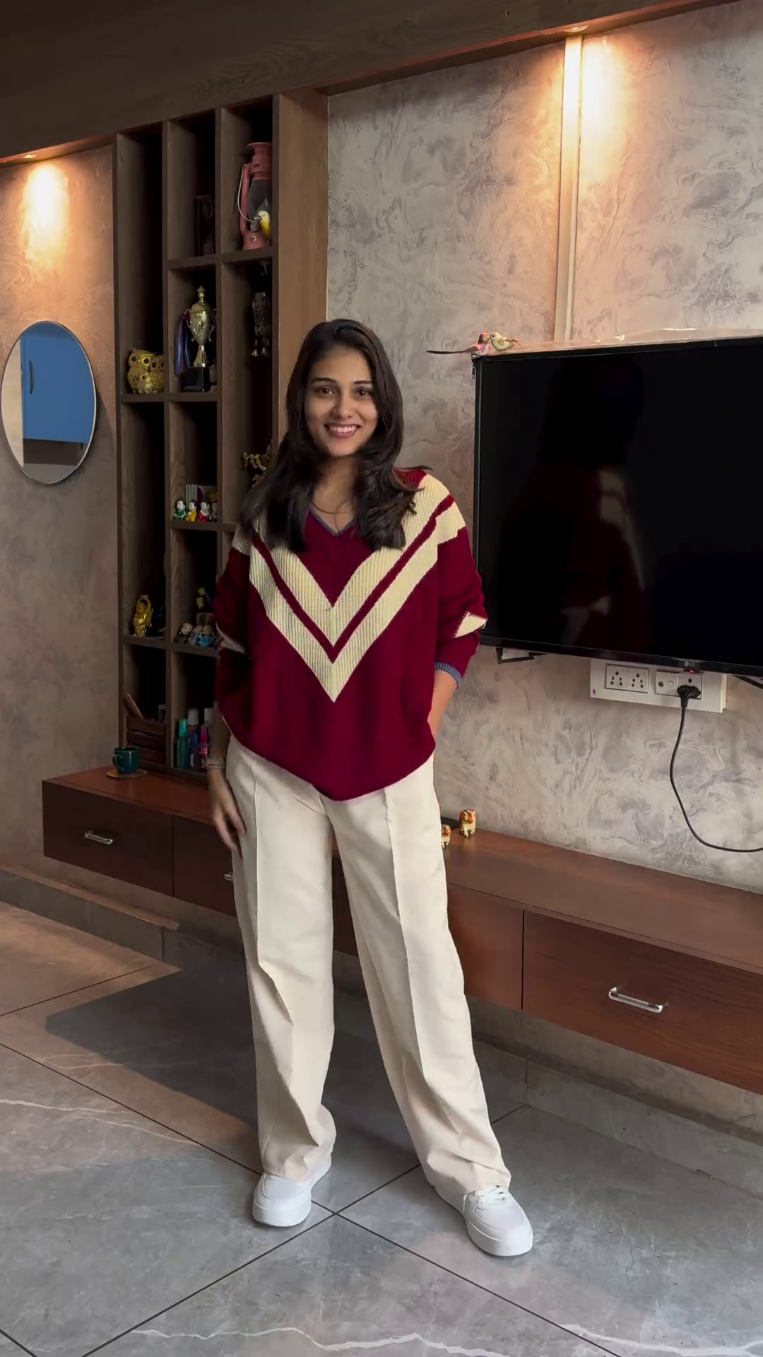 Chevron Knit Pullover with Beige Straight-Leg Trousers