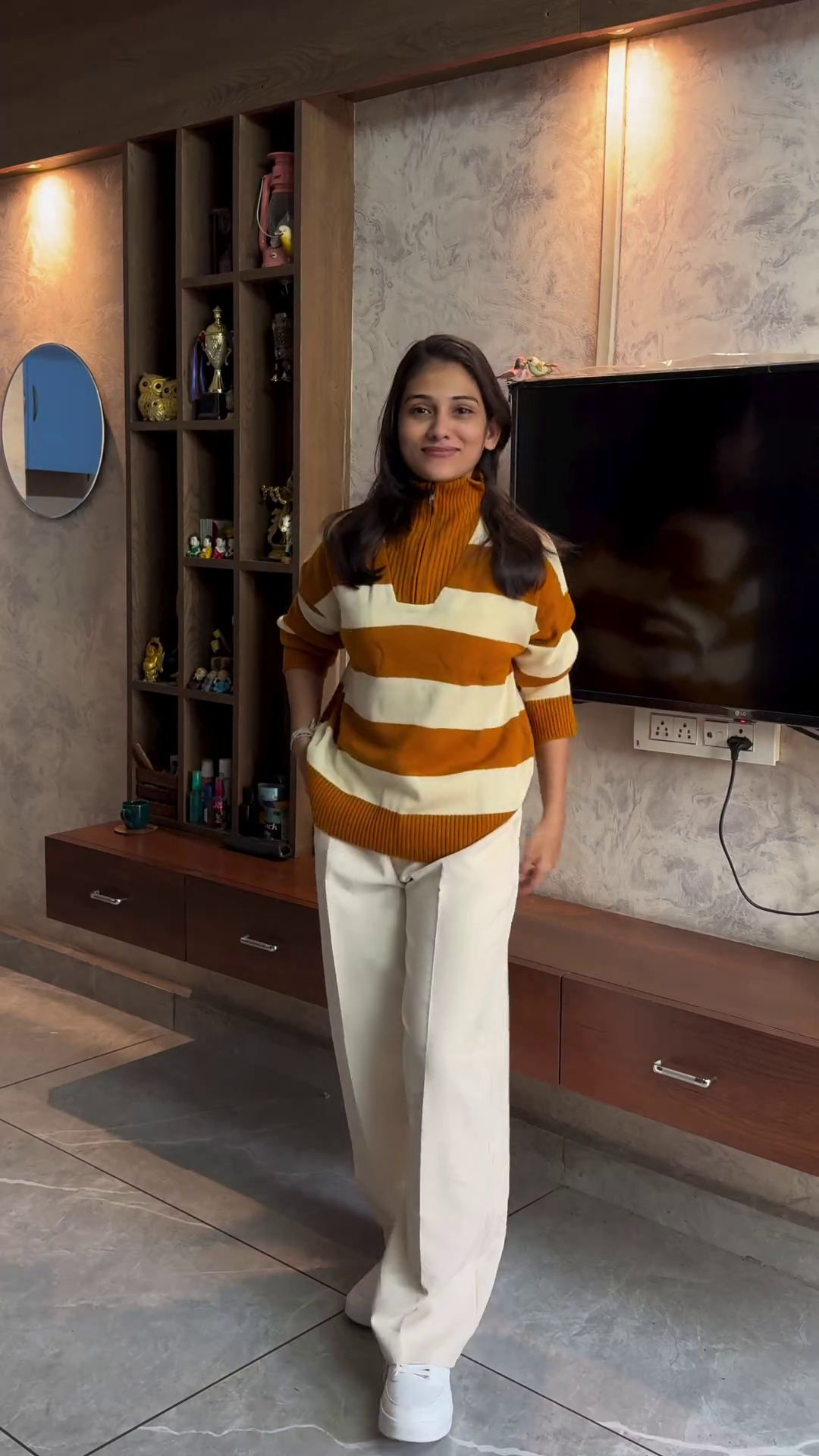 Chevron Knit Pullover with Beige Straight-Leg Trousers