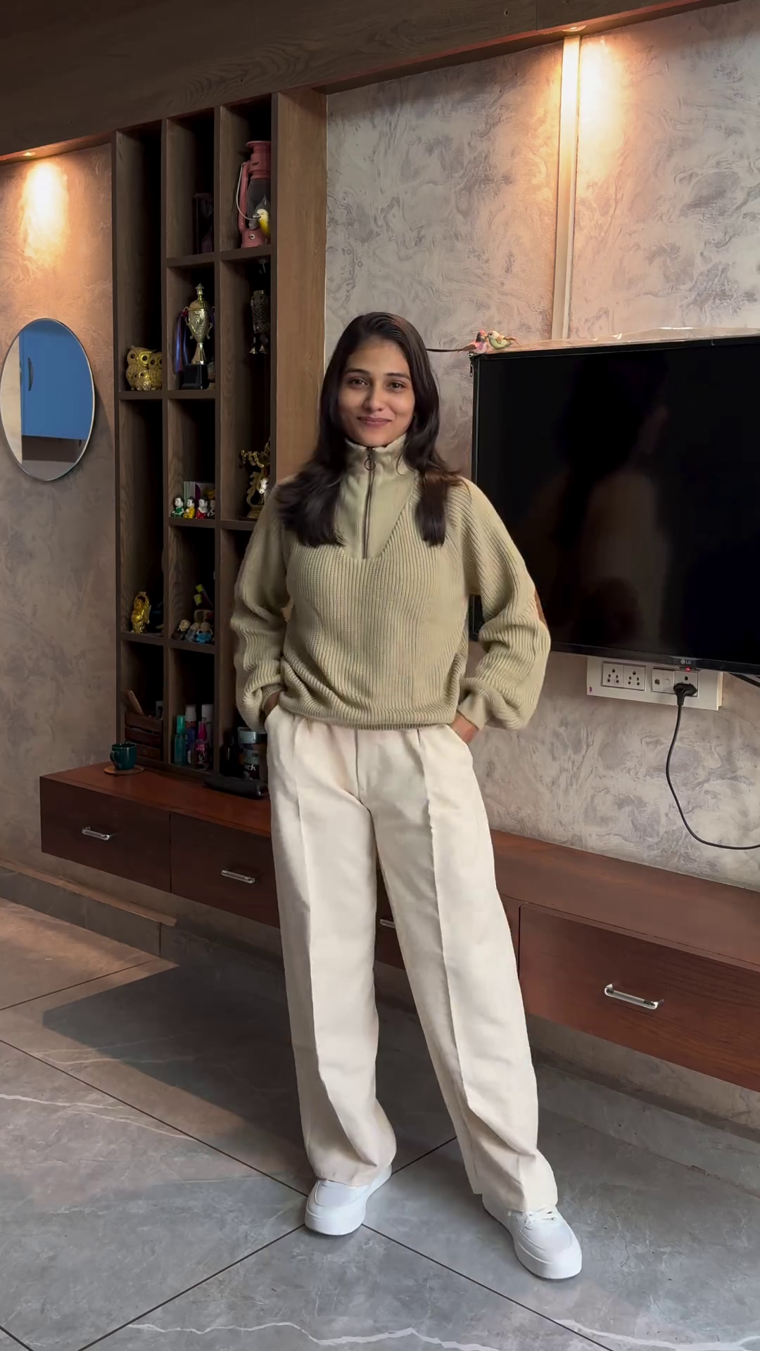 Chevron Knit Pullover with Beige Straight-Leg Trousers