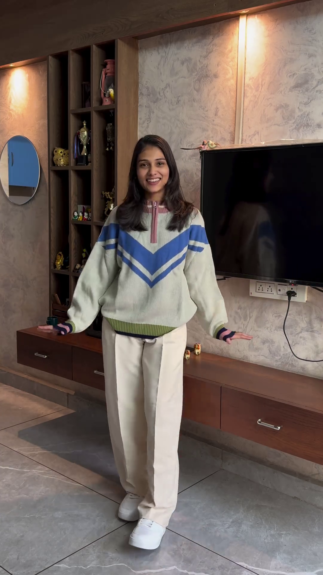 Chevron Knit Pullover with Beige Straight-Leg Trousers