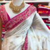 White & Pink Handloom Mercerised Cotton Bengal Saree – A Graceful Symbol of Elegance