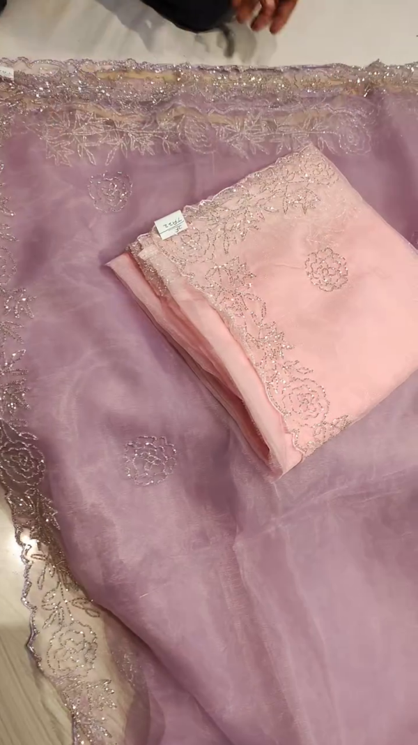 Elegant Embroidered Net Fabric – A Timeless Blend of Grace & Sophistication