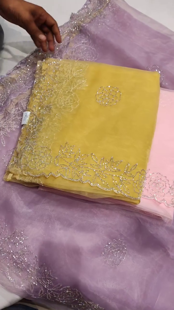 Elegant Embroidered Net Fabric – A Timeless Blend of Grace & Sophistication