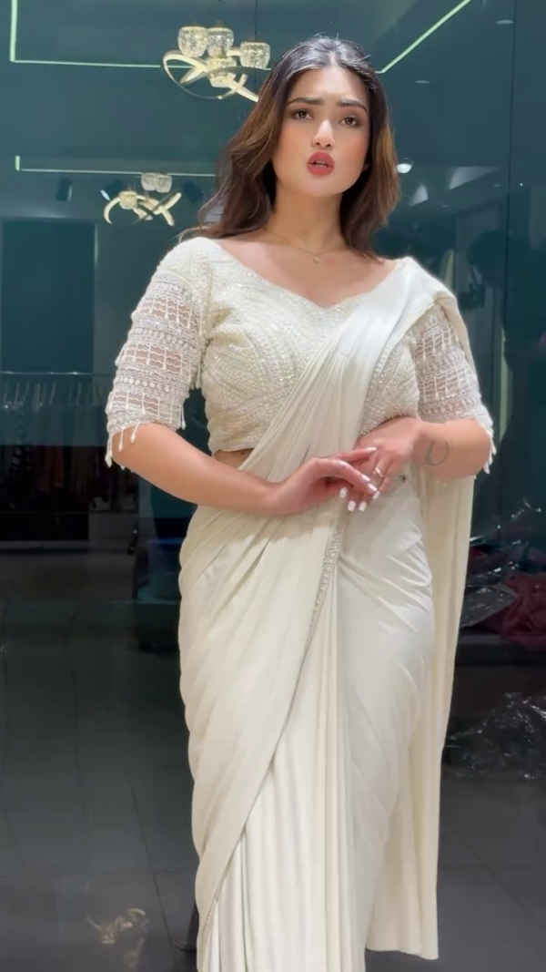 White Drape Saree with Pearl Embroidery – A Graceful Fusion of Elegance and Sophistication