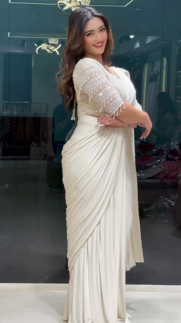 White Drape Saree with Pearl Embroidery – A Graceful Fusion of Elegance and Sophistication