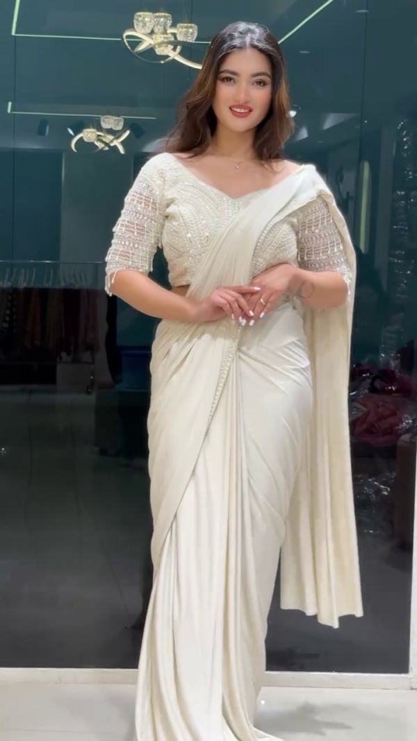 White Drape Saree with Pearl Embroidery – A Graceful Fusion of Elegance and Sophistication