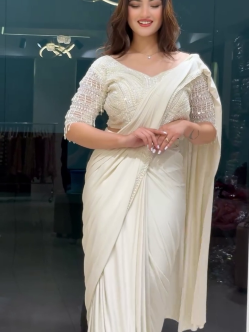 White Drape Saree with Pearl Embroidery – A Graceful Fusion of Elegance and Sophistication