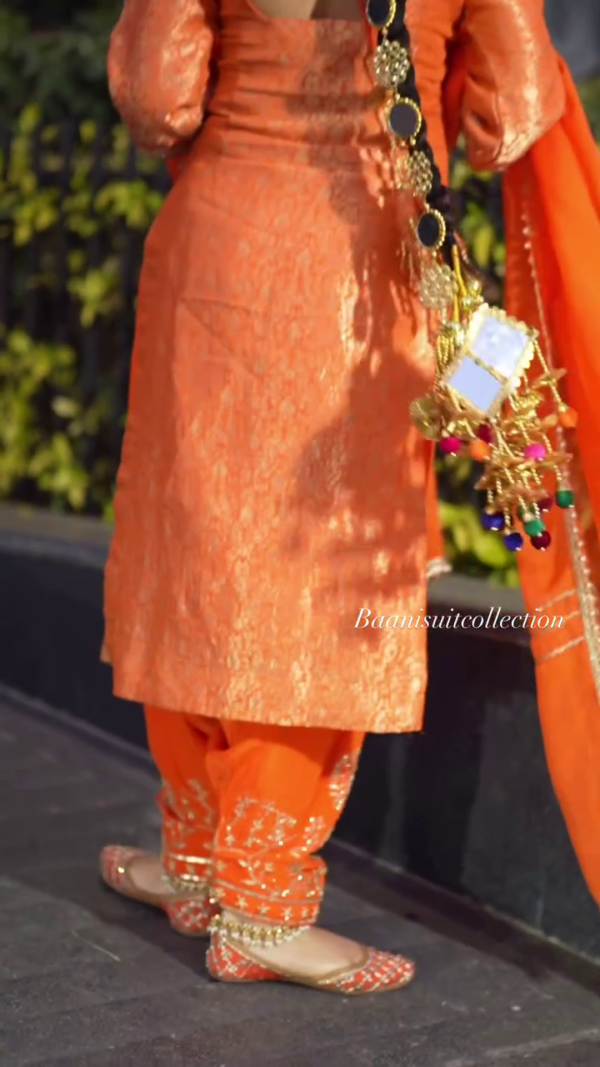 Exotic Orange Color Thread Work Top – A Bold and Elegant Addition to Your Wardrobe