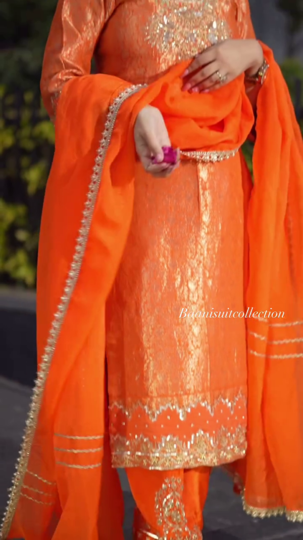 Exotic Orange Color Thread Work Top – A Bold and Elegant Addition to Your Wardrobe