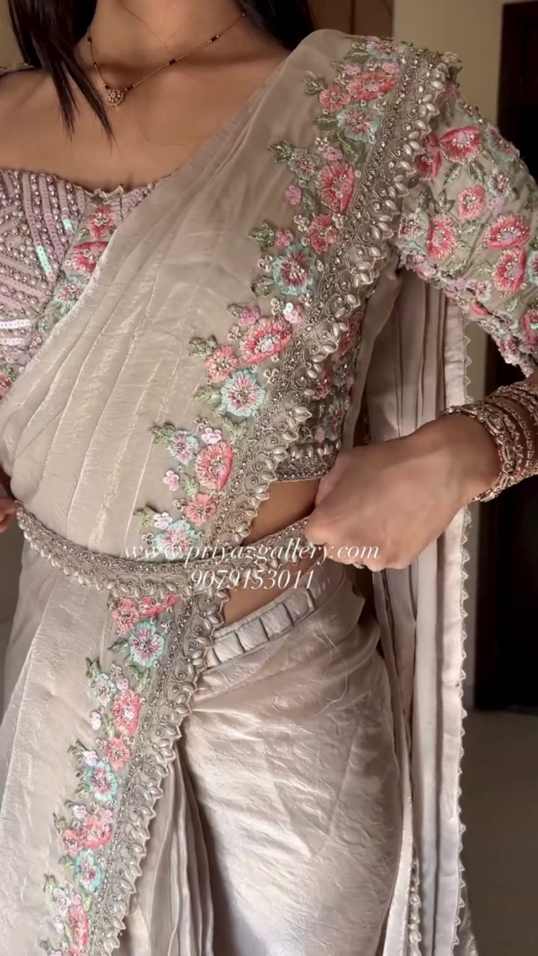 Elegant Beige Embroidered Saree
