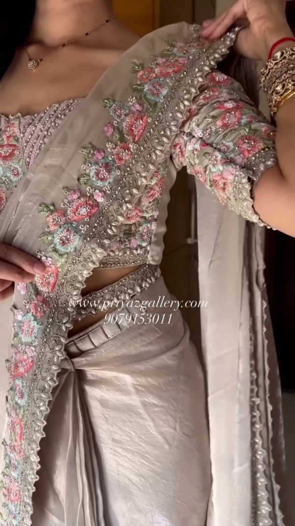 Elegant Beige Embroidered Saree