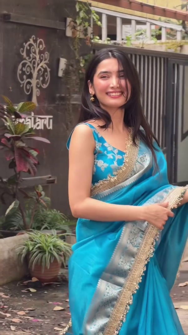 Elegant Teal Blue Saree with Golden Border