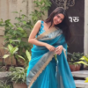 Elegant Teal Blue Saree with Golden Border
