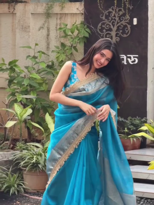 Elegant Teal Blue Saree with Golden Border