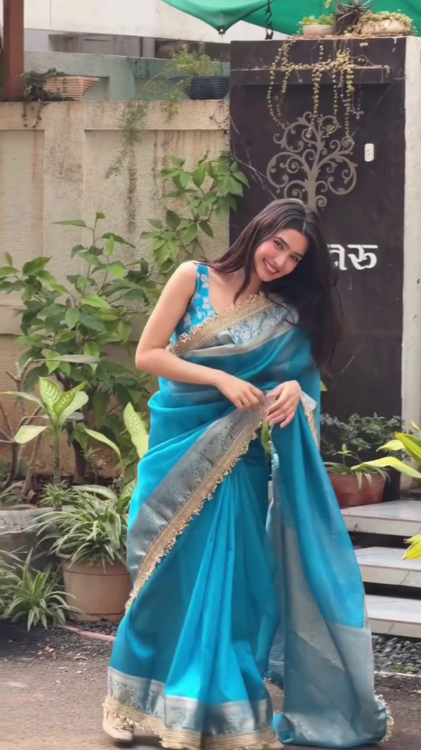 Elegant Teal Blue Saree with Golden Border
