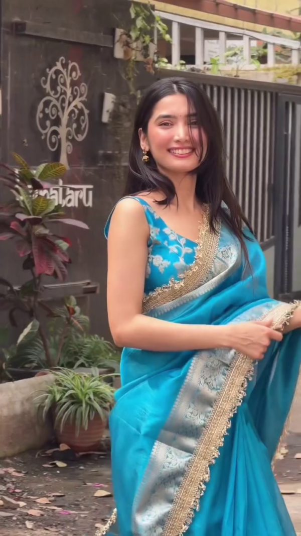Elegant Teal Blue Saree with Golden Border