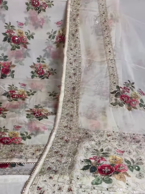 White Soft Tissue Silk Saree with Scalloped Sequins Zardozi Pearl Handwork – A Timeless Masterpiece of Elegance